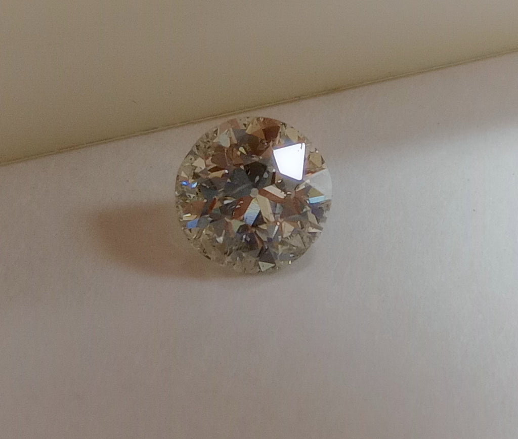 GIA 1.58 CT Circular Brilliant Cut Diamond, J, I1