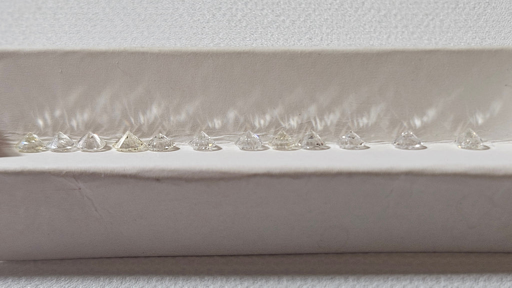 2.34 TCW Natural Round Diamond Parcel Imperfect 1/5ths 235PPC