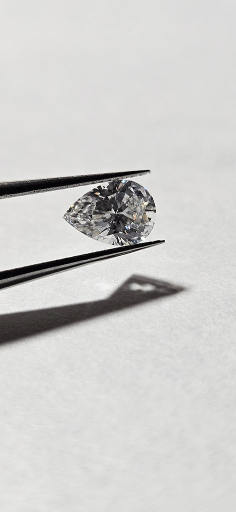 GIA 0.72 CT Natural Pear Diamond, E, SI2 -67