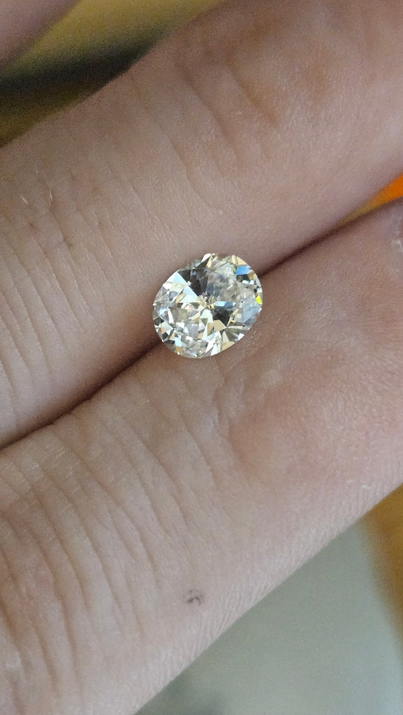 GIA 0.90 CT Natural Oval Diamond, J, SI2 -60