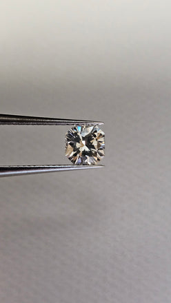 0.64 CT Cut-Cornered Rectangular Modified Brilliant, H, VS2 GIA