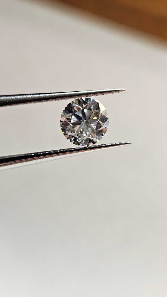 GIA 0.90 CT Natural RB H VS1 -60