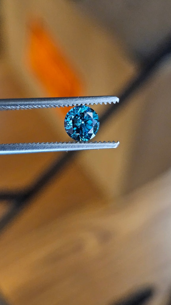 0.54 CT Natural Treated Round Brilliant