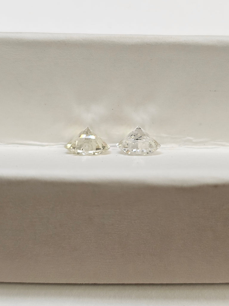 2 Natural Round Diamonds .81 CTW SI (Non match)