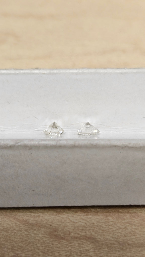 2 Natural Round Diamonds .61 TCW SI (Non Match)