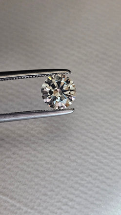 GIA 1.01 CT Natural Round Diamond, J, I1