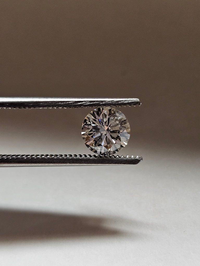 1.02 CT Natural Round Brilliant F I1 -63