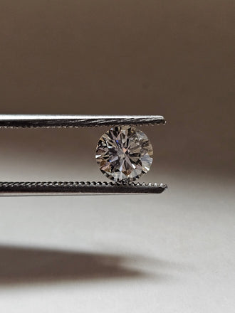 1.02 CT Natural Round Brilliant F I1 -63