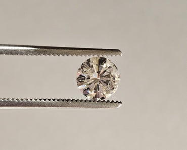 0.84 CT Natural Round Brilliant I I2