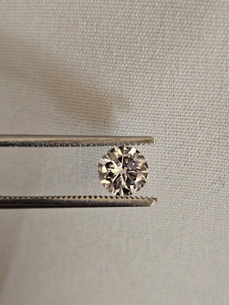 0.75 CT Natural Round Brilliant I I1