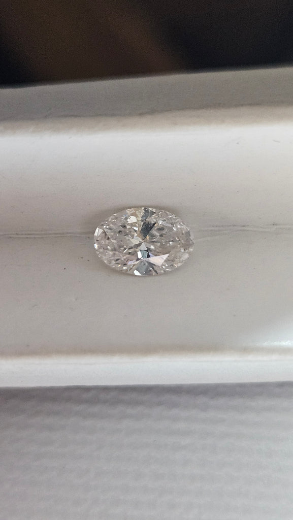 GIA 0.72 CT Natural Oval Diamond, F, I1