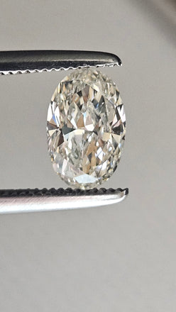 GIA 0.70 CT Natural Oval Diamond, J, SI2