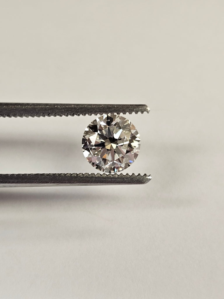 1.01 CT Natural Round Brilliant J SI2