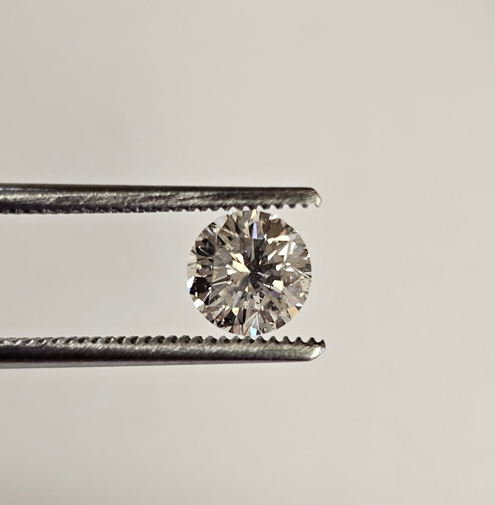 GIA 1.01 CT Natural Round Diamond, M, SI2