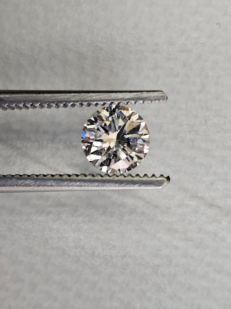 0.71 CT Natural Round Brilliant, J I1