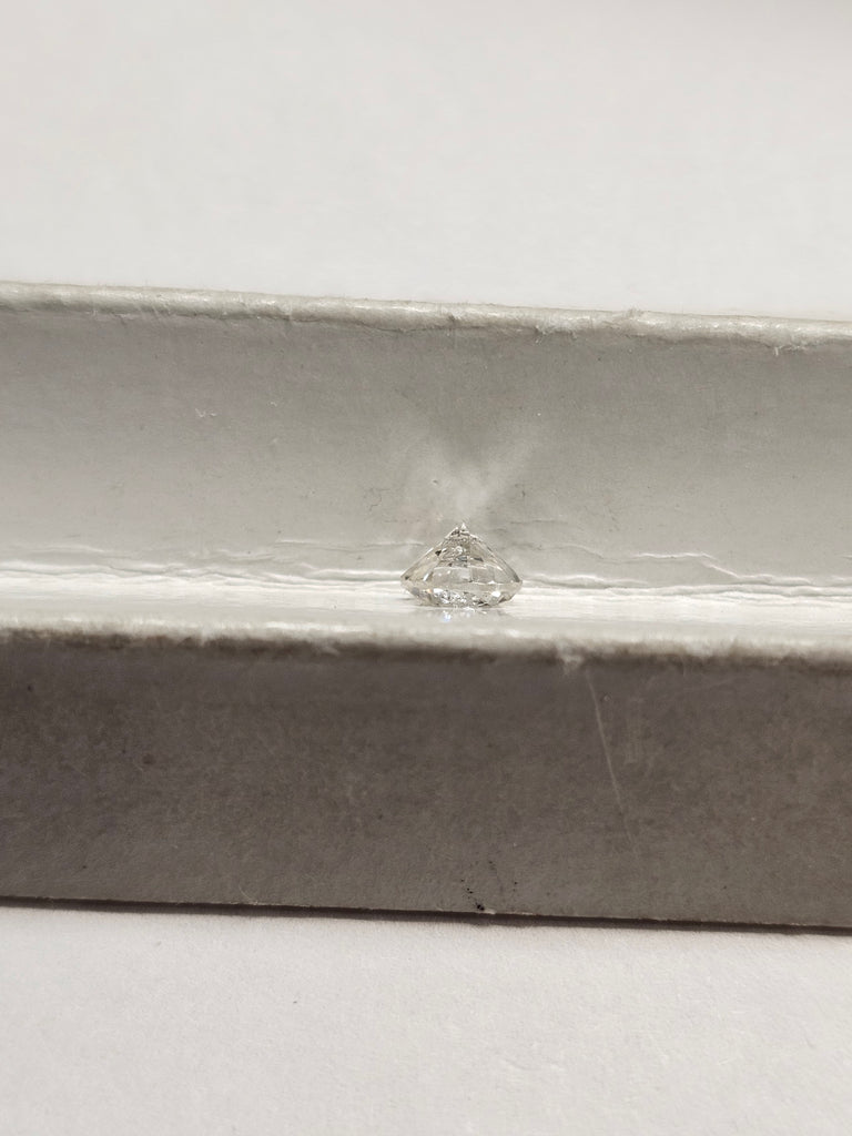 0.67 CT Natural Round Brilliant, I, I1