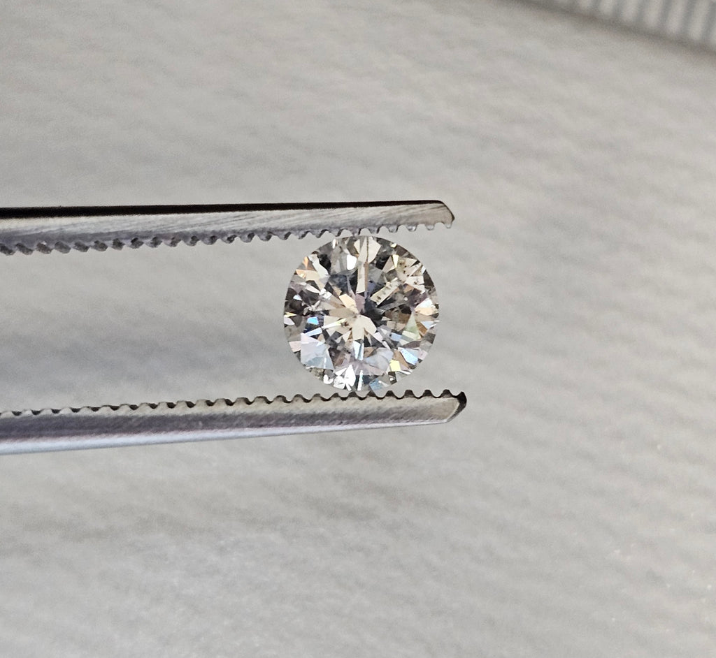0.67 CT Natural Round Brilliant, I, I1