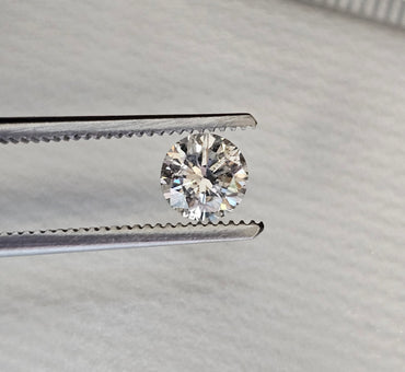 0.67 CT Natural Round Brilliant, I, I1