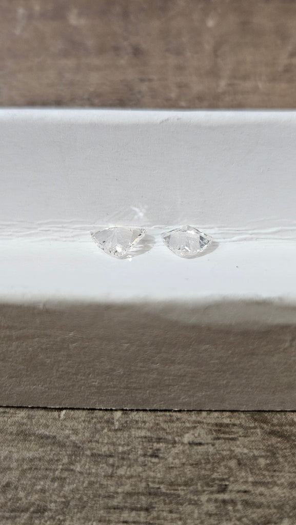 0.61 TCW Natural White Imperfect Trilliant Cuts ( Non-matching )