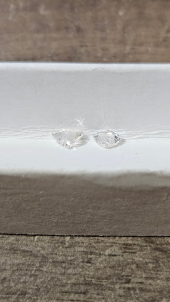 0.61 TCW Natural White Imperfect Trilliant Cuts ( Non-matching )