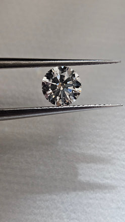 0.76 CT Natural Round J VS1-VS2