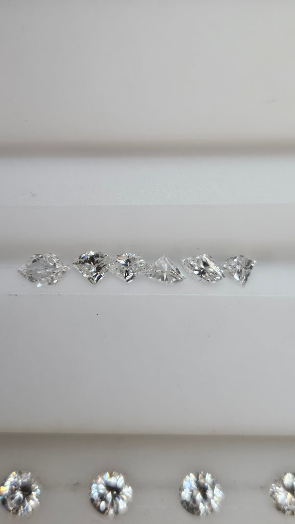 1.52 CTW Natural Shield Cut Parcel White SI+ AVG 1/4