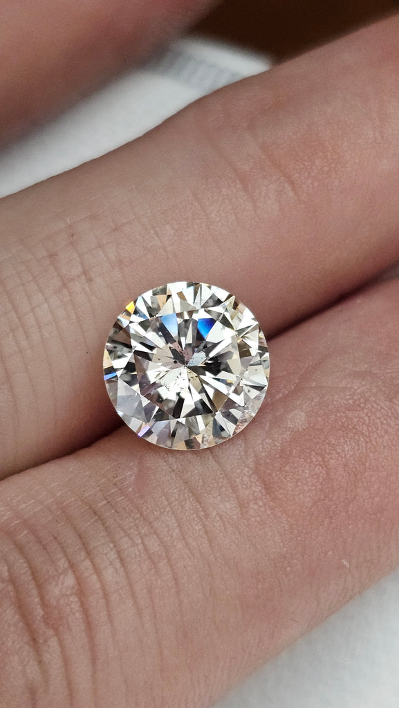 3.77 CT Natural Round Brilliant IJ I1