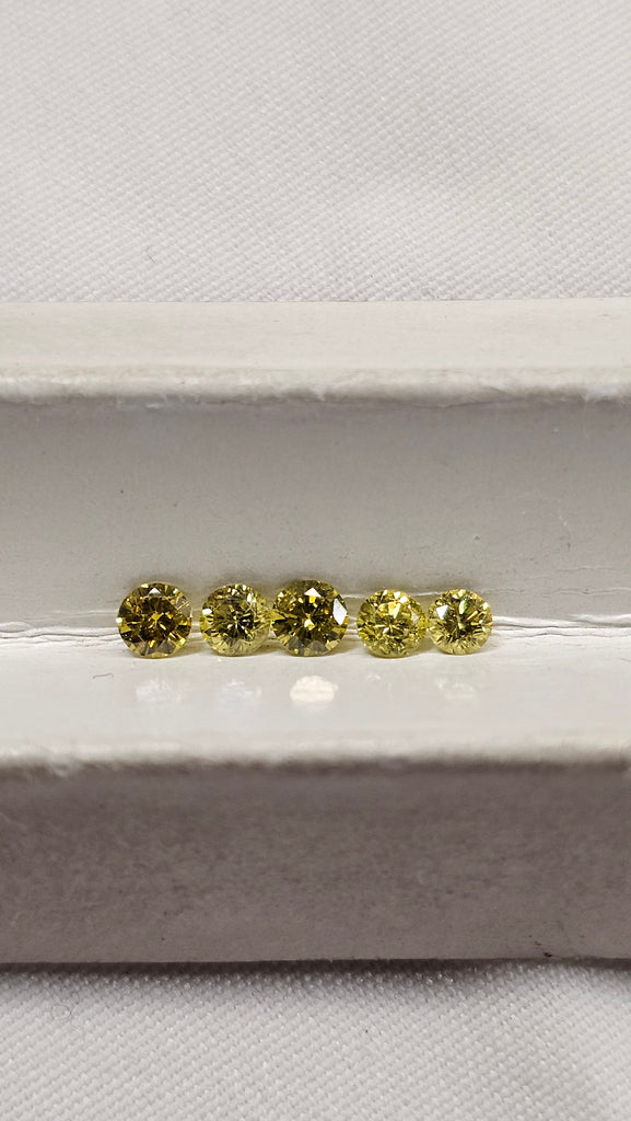 0.67 TCW Natural Yellow Treated Diamonds I1
