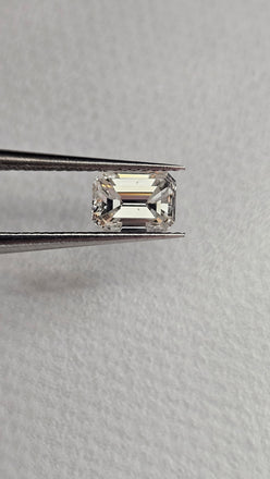 0.74 CT Natural Emerald Cut GH VS * Chipped *