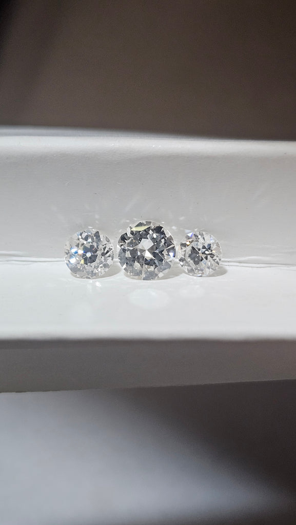 0.81 TCW Natural Old european Cut parcel White VS AVG .27 ( 3 stones )