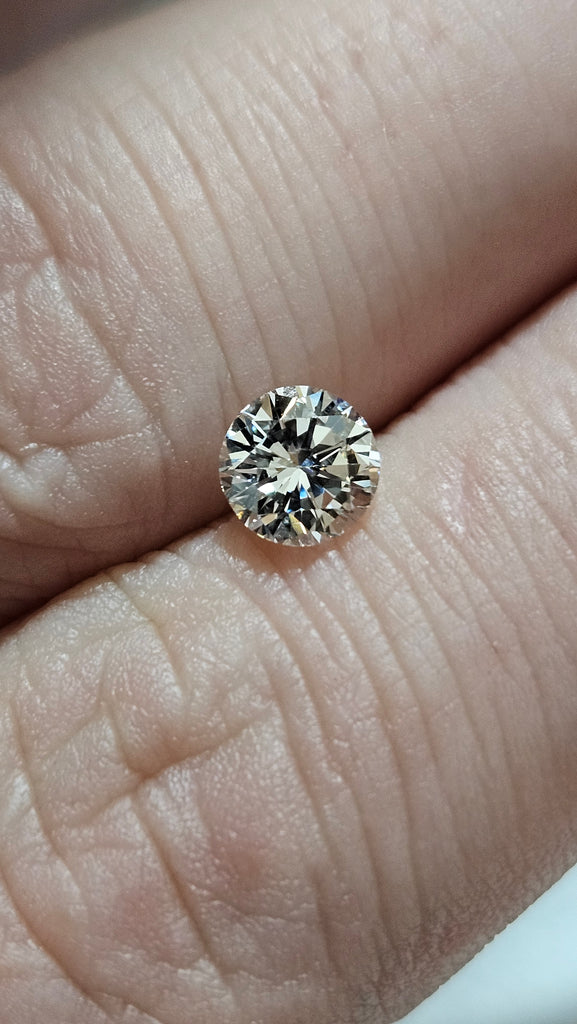 0.70 CT Natural Round Brilliant HI SI1