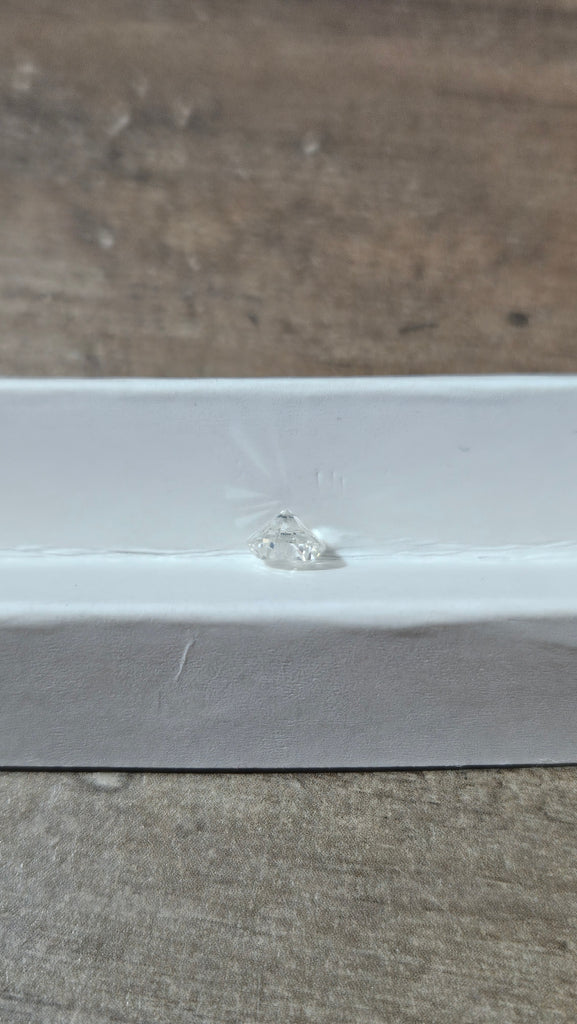 0.62 CT Natural Round Brilliant HI I1