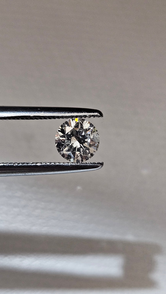0.62 CT Natural Round Brilliant HI I1