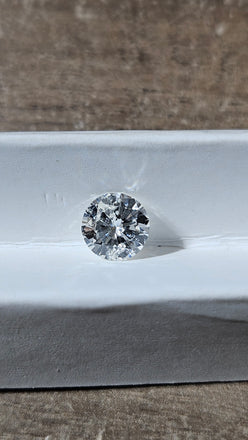 0.94 CT Natural Round Brilliant HI I2