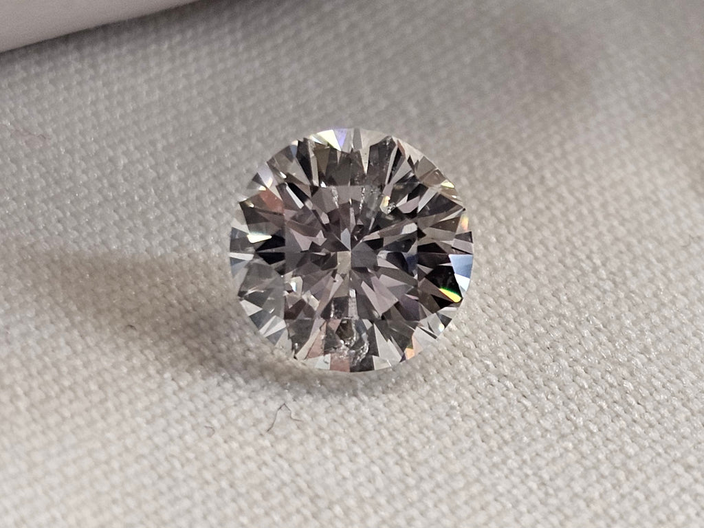 1.24 CT Natural Round Brilliant Diamond D-E SI2