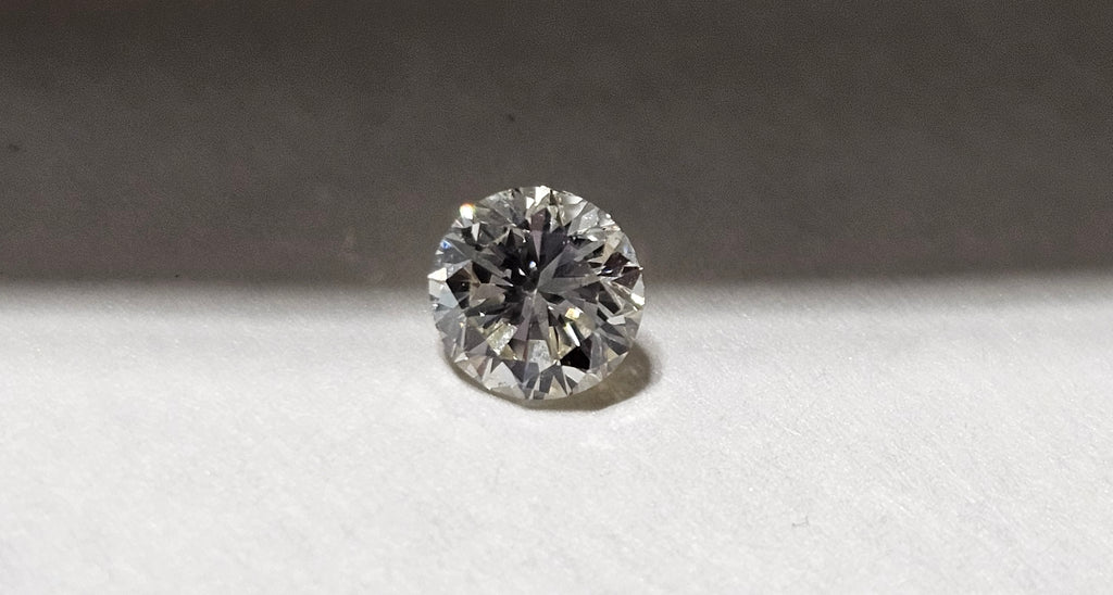 0.54 CT Round Brilliant Natural Diamond J-K SI2