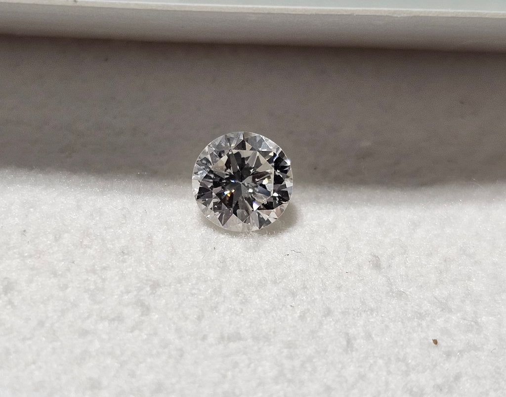 0.59 CT Round Brilliant Natural Diamond H-I SI2