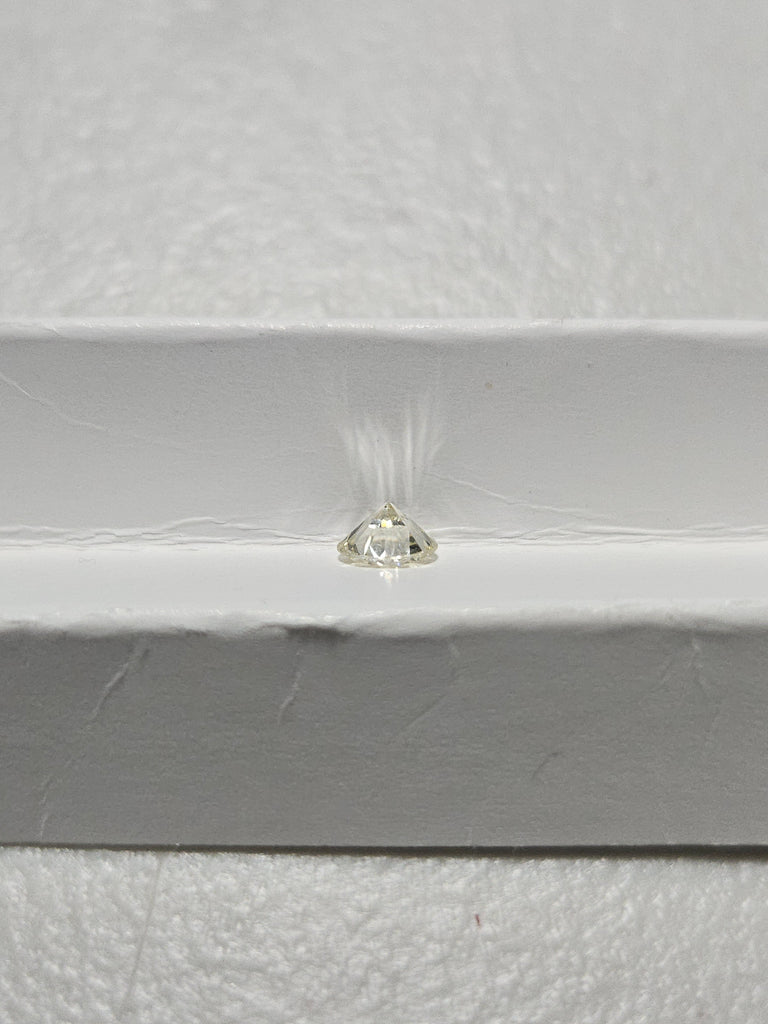 0.56 CT Round Brilliant Natural Diamond L-M SI1-SI2