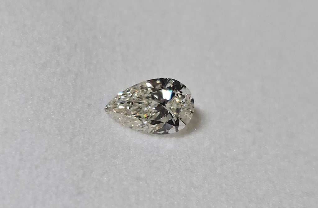 1.00 CT IGI Pear Shaped Natural Diamond I I1 XXVG
