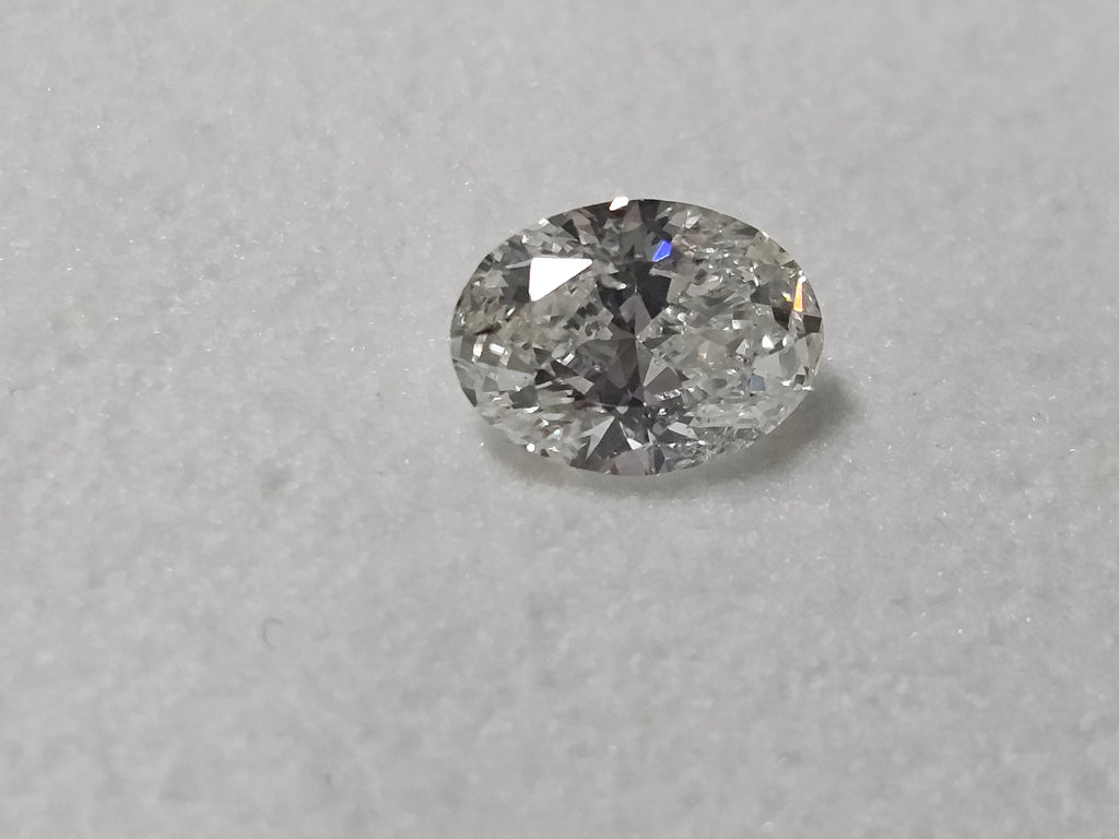 0.90 CT IGI Oval Shaped Natural Diamond F SI2