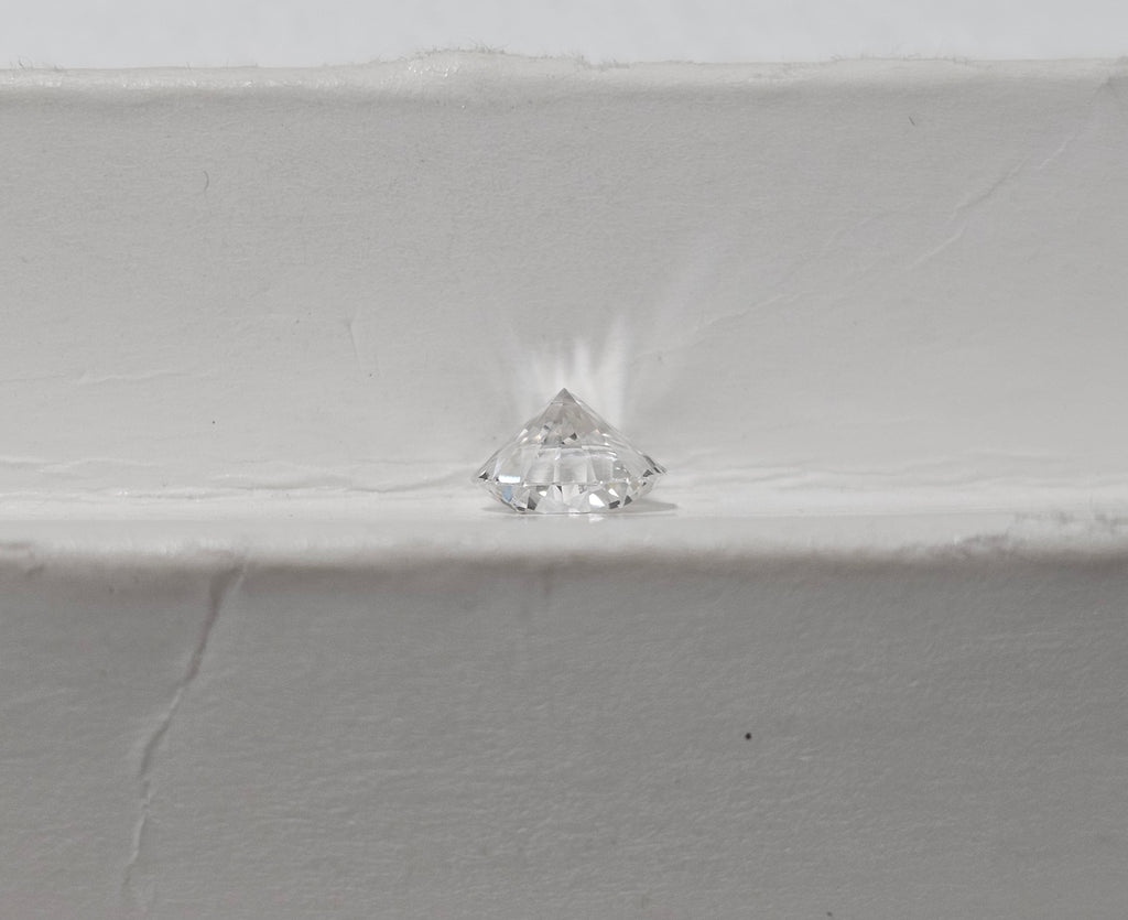 0.67 CT Round Brilliant Natural Diamond E-F VS2-SI1