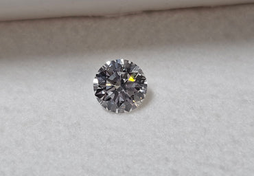0.67 CT Round Brilliant Natural Diamond E-F VS2-SI1