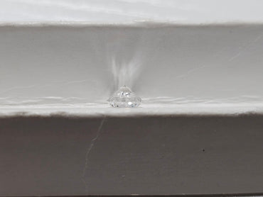 0.63 CT Natural Round Brilliant FG SI2