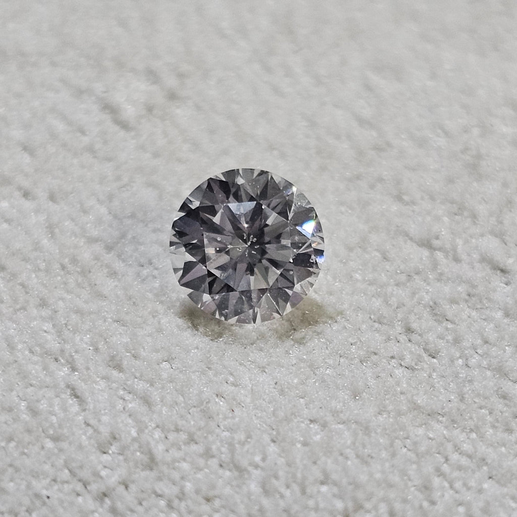 0.63 CT Natural Round Brilliant FG SI2