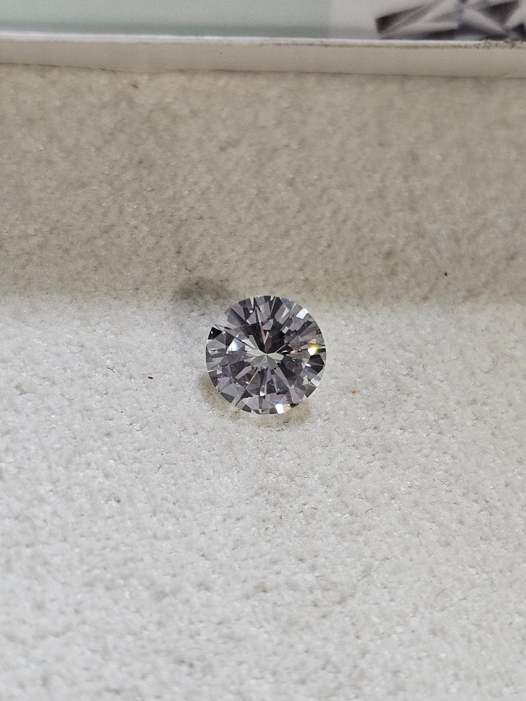 0.54 CT Natural Round Brilliant FG SI1