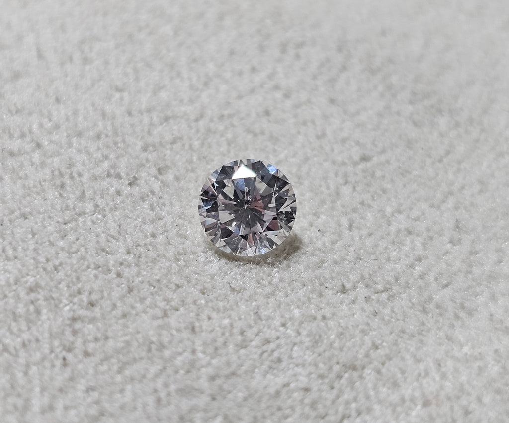 0.59 CT Natural Round Brilliant HI I1