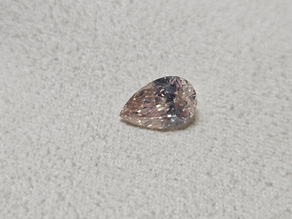 IGI 1.51 CT Natural Pear Brilliant M SI2 VG XX Faint Brown