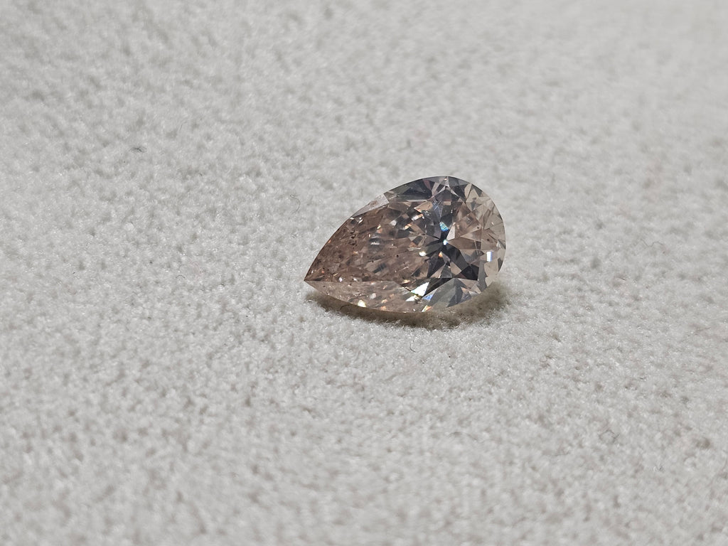 IGI 1.51 CT Natural Pear Brilliant M SI2 VG XX Faint Brown