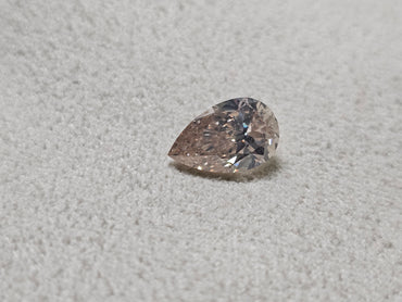IGI 1.51 CT Natural Pear Brilliant M SI2 VG XX Faint Brown