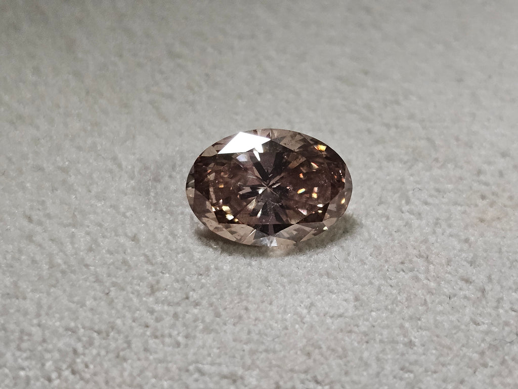 IGI 2.01 CT Natural Oval Brilliant Y-Z SI2 VG XX Light Brown